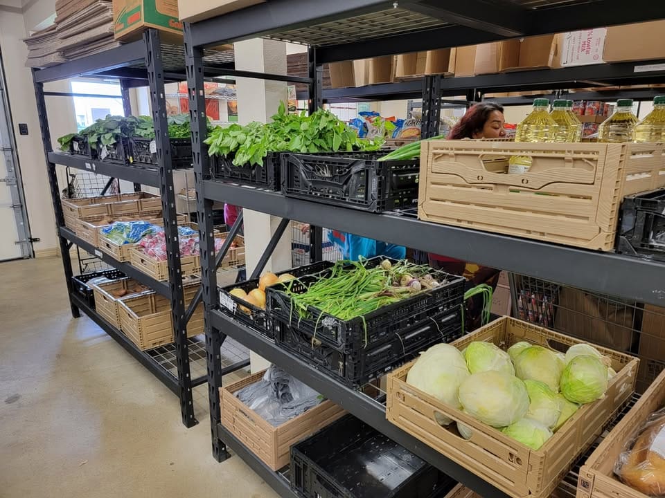 tool-photo Stocked shelves with fresh food at the Community Food Pantry in Tool, Texas